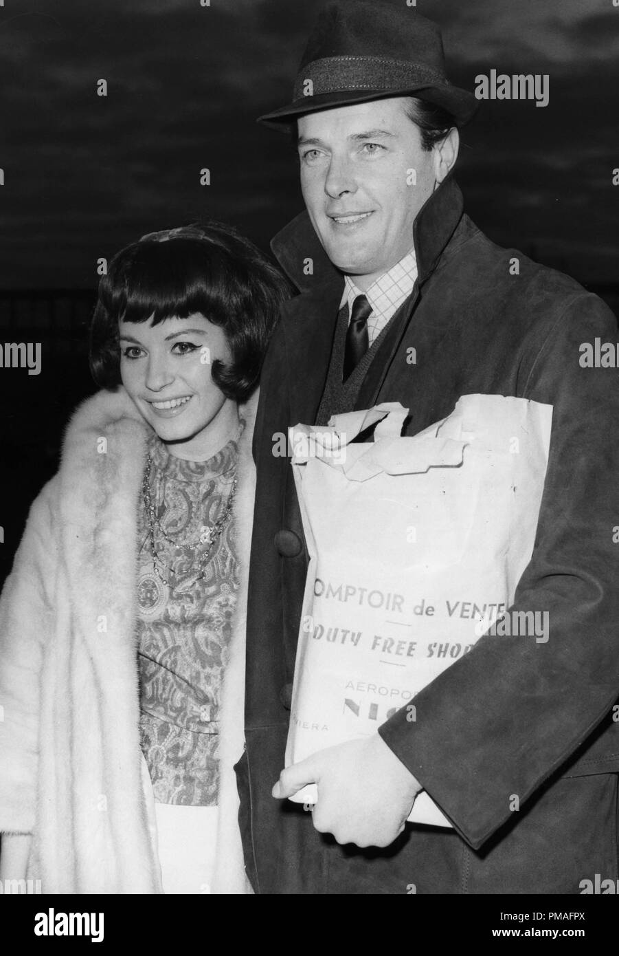 Roger Moore with his wife Luisa Mattioli, 1965  © JRC /The Hollywood Archive - All Rights Reserved  File Reference # 32633 761JRC Stock Photo