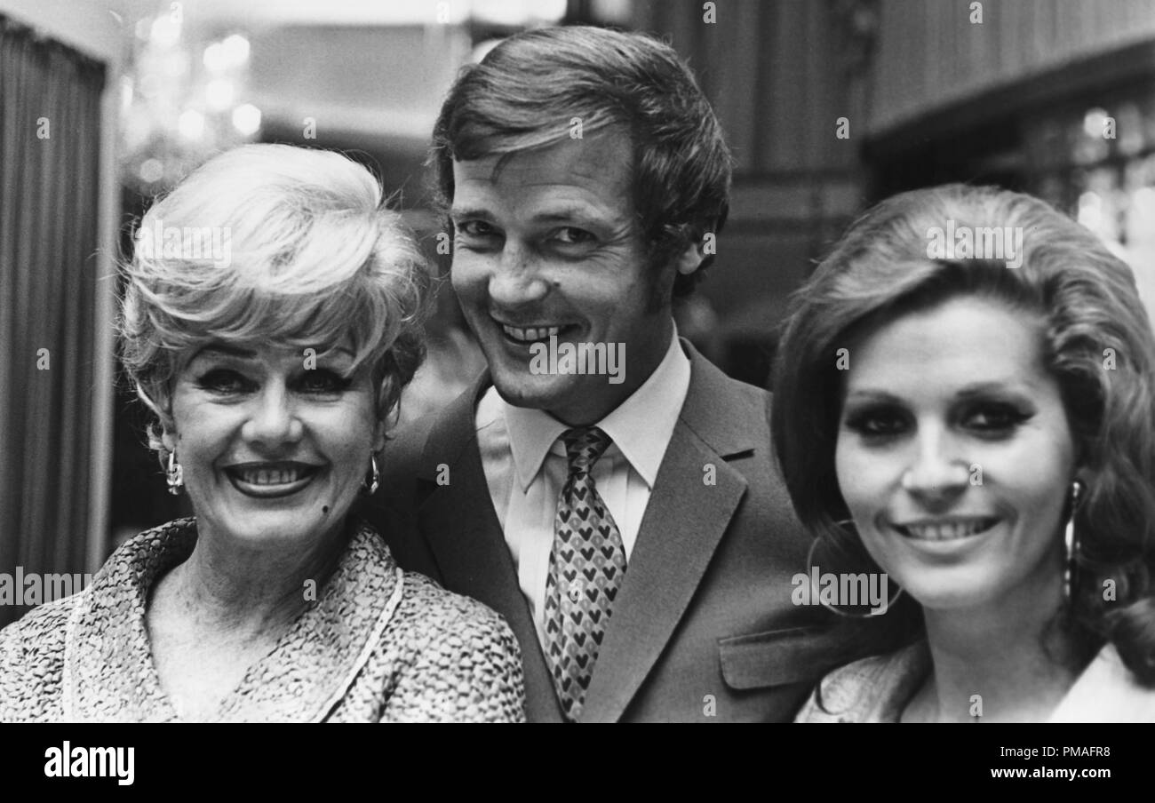 Ginger Rogers with Roger Moore and his wife Luisa Mattioli, 1969  © JRC /The Hollywood Archive - All Rights Reserved  File Reference # 32633 769JRC Stock Photo