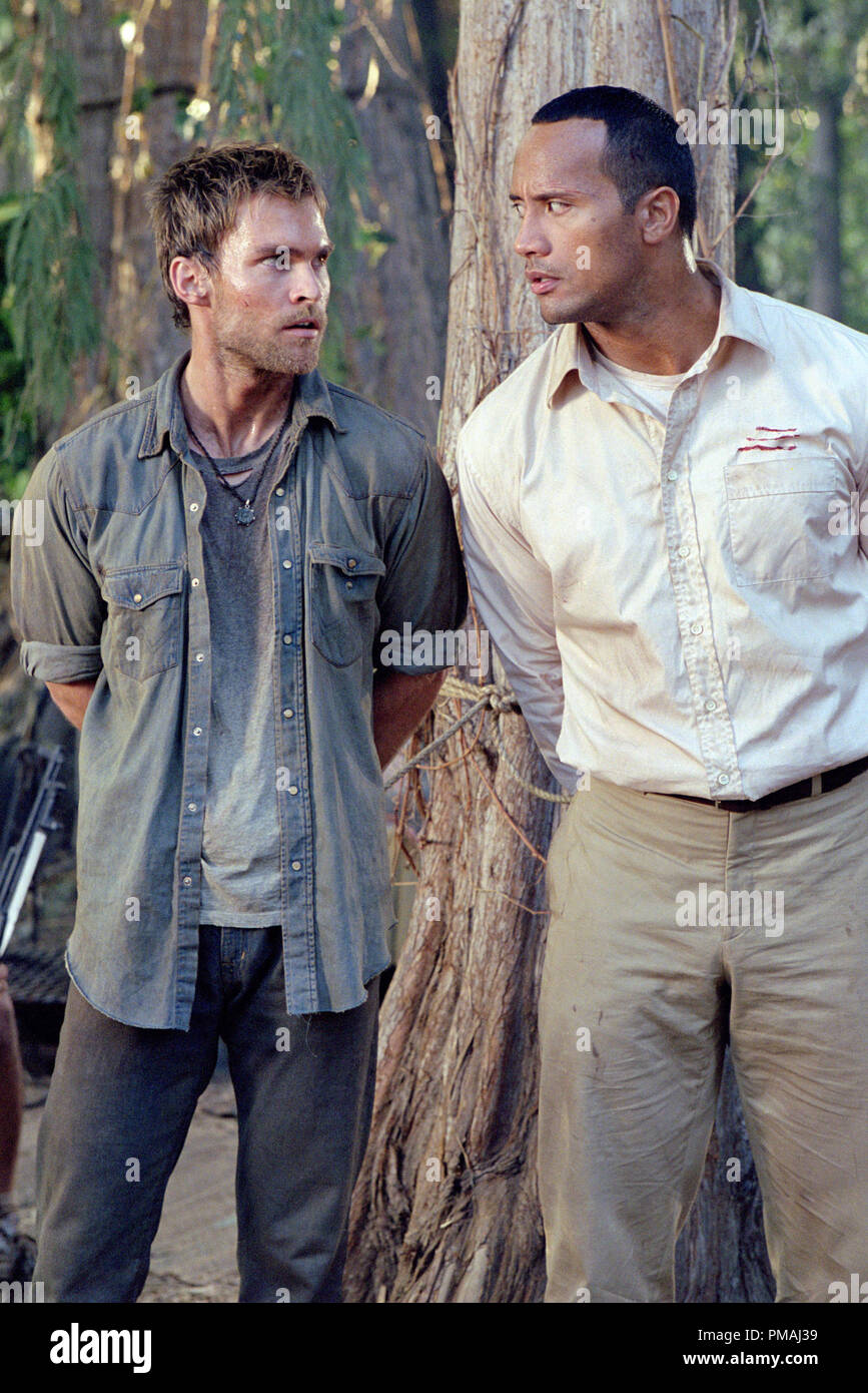 Travis (SEANN WILLIAM SCOTT) translates for Beck (THE ROCK) to a group ...