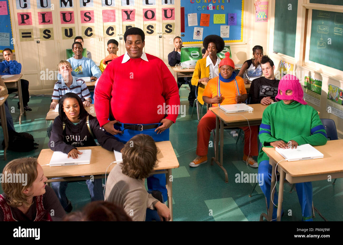 Doris (Kyla Pratt, seated left) brings her new friends, Fat Albert (Kenan Thompson) and the Cosby Kids to class with her.  Fat AlbertÕs pals are (back row, L-R) Bill (Keith D. Robinson), Bucky (Alphonso McAuley) and Old Weird Harold (Aaron A. Frazier).  In the middle row are schoolmates played by Aaron Carter (L) and Joel Madden (R) seated beside Mushmouth (Jermaine Williams, center).  Dumb Donald (Marques B. Houston) is seated in the front row on the right. 'Fat Albert' (2004) Stock Photo