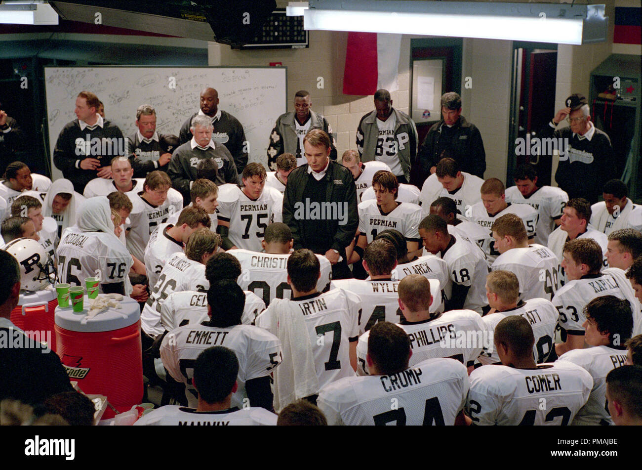 Coach Gary Gaines (BILLY BOB THORNTON), Permian coaching staff and team in Imagine Entertainment's adaptation of H.G. Bissinger's prize-winning book, Friday Night Lights. (2004) Stock Photo
