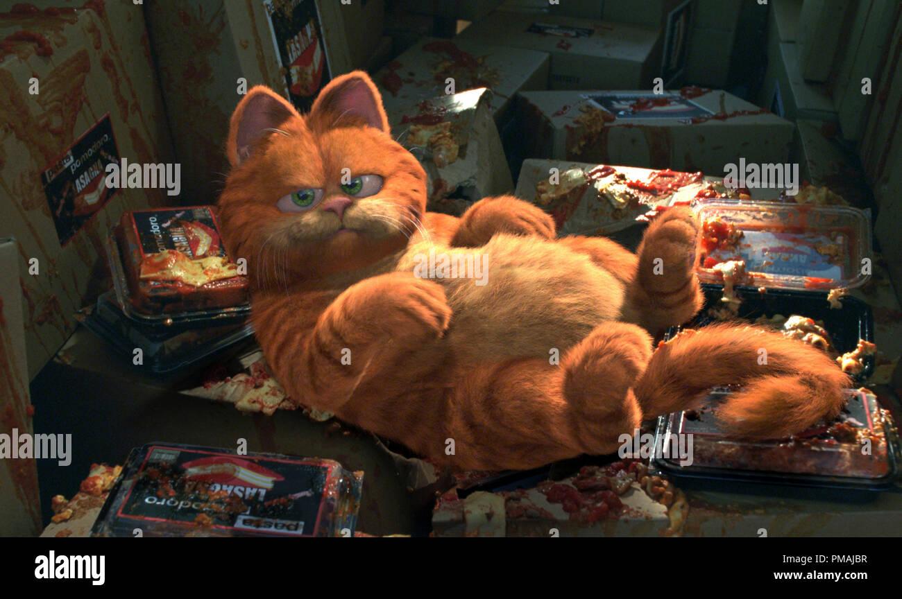 Garfield revels in being saved by his favorite dish: lasagna. 'Garfield The Movie' (2004) Stock Photo