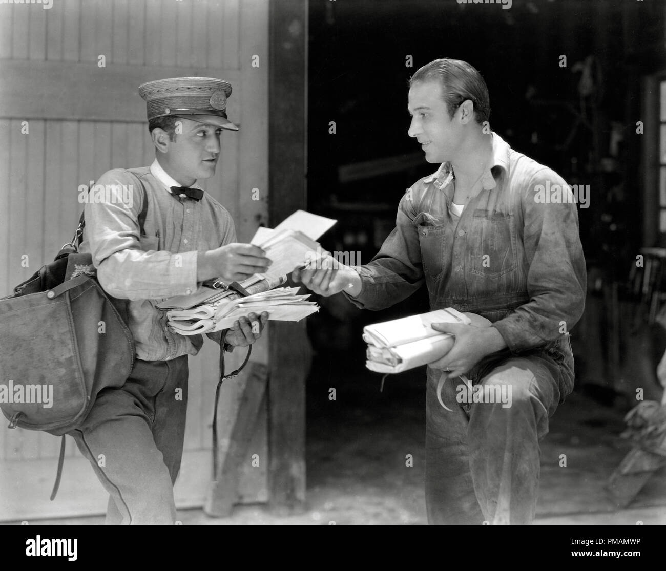 Rudolph Valentino getting his fan mail circa 1925 File Reference # 070THA For Editorial Use Only - All Rights Reserved Stock Photo - Alamy
