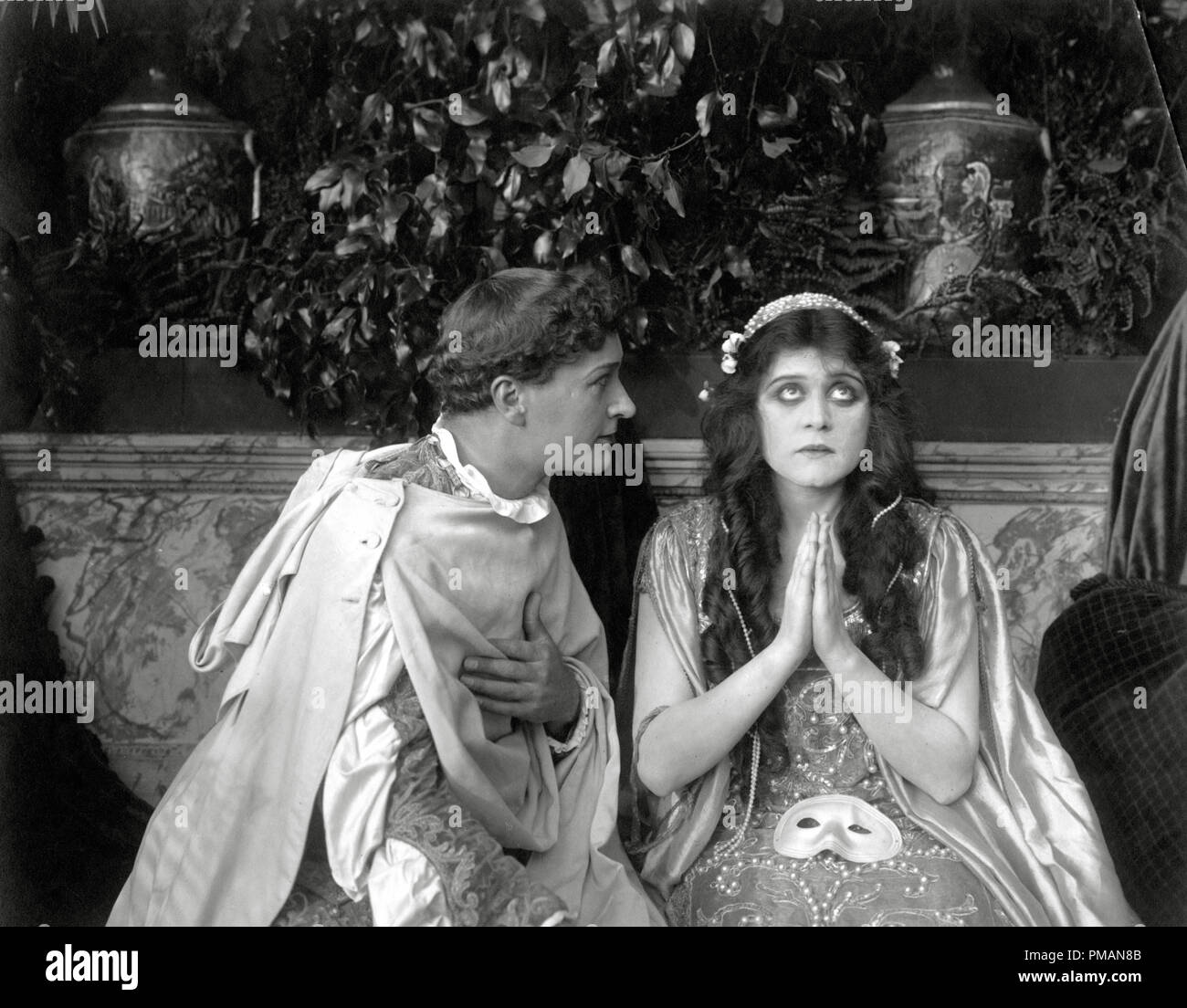 Film Still/Publicity Still of 'Romeo and Juliet'  Harry Hillard, Theda Bara 1916 Fox Film  Cinema Publishers Collection - No Release - For Editorial Use Only File Reference # 33505 413THA Stock Photo