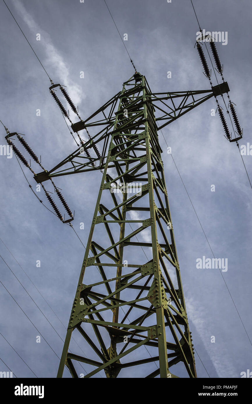 110kV High voltage electricity pylon in Austria. Power grid. Stock Photo