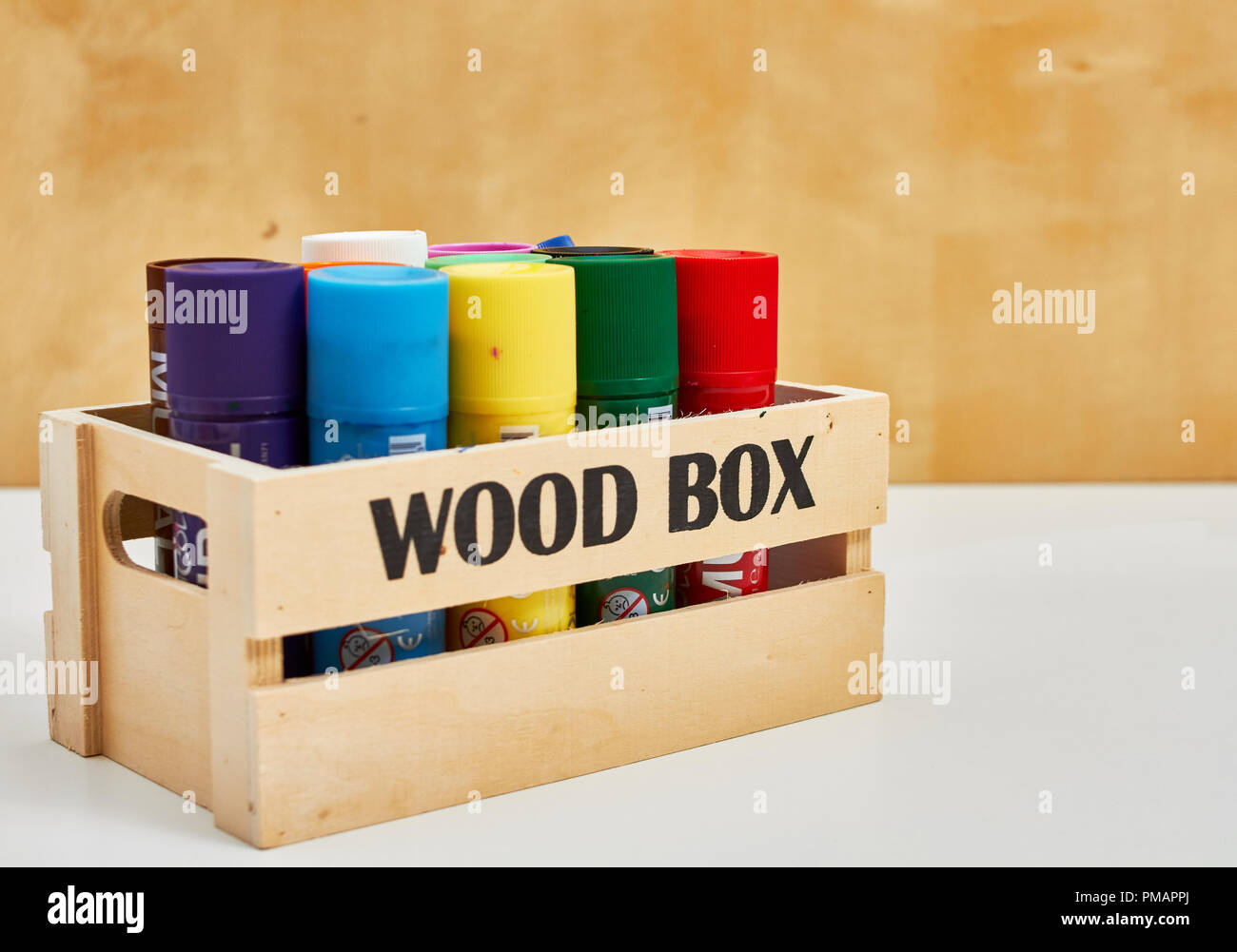 wood box full of big crayons Stock Photo Alamy
