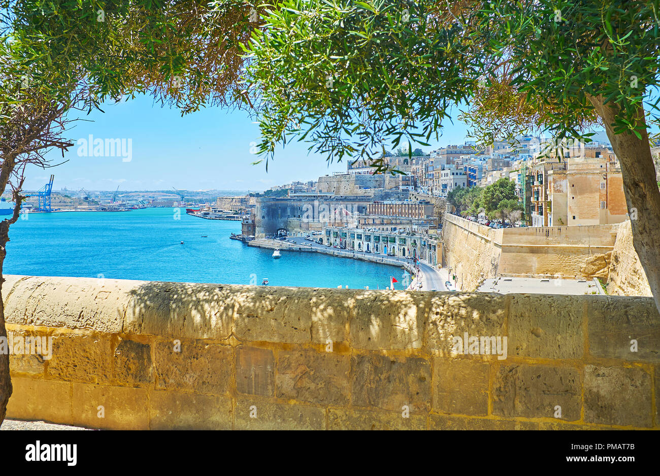 The viewpoint terrace of Lower Barrakka Gardens in shade of the olive ...