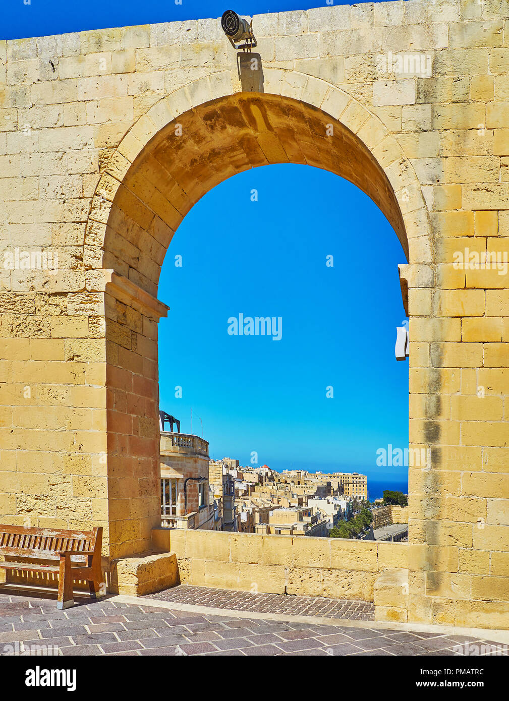 The old Valletta through the arch of terrace in Upper Barrakka Gardens, Valletta, Malta. Stock Photo