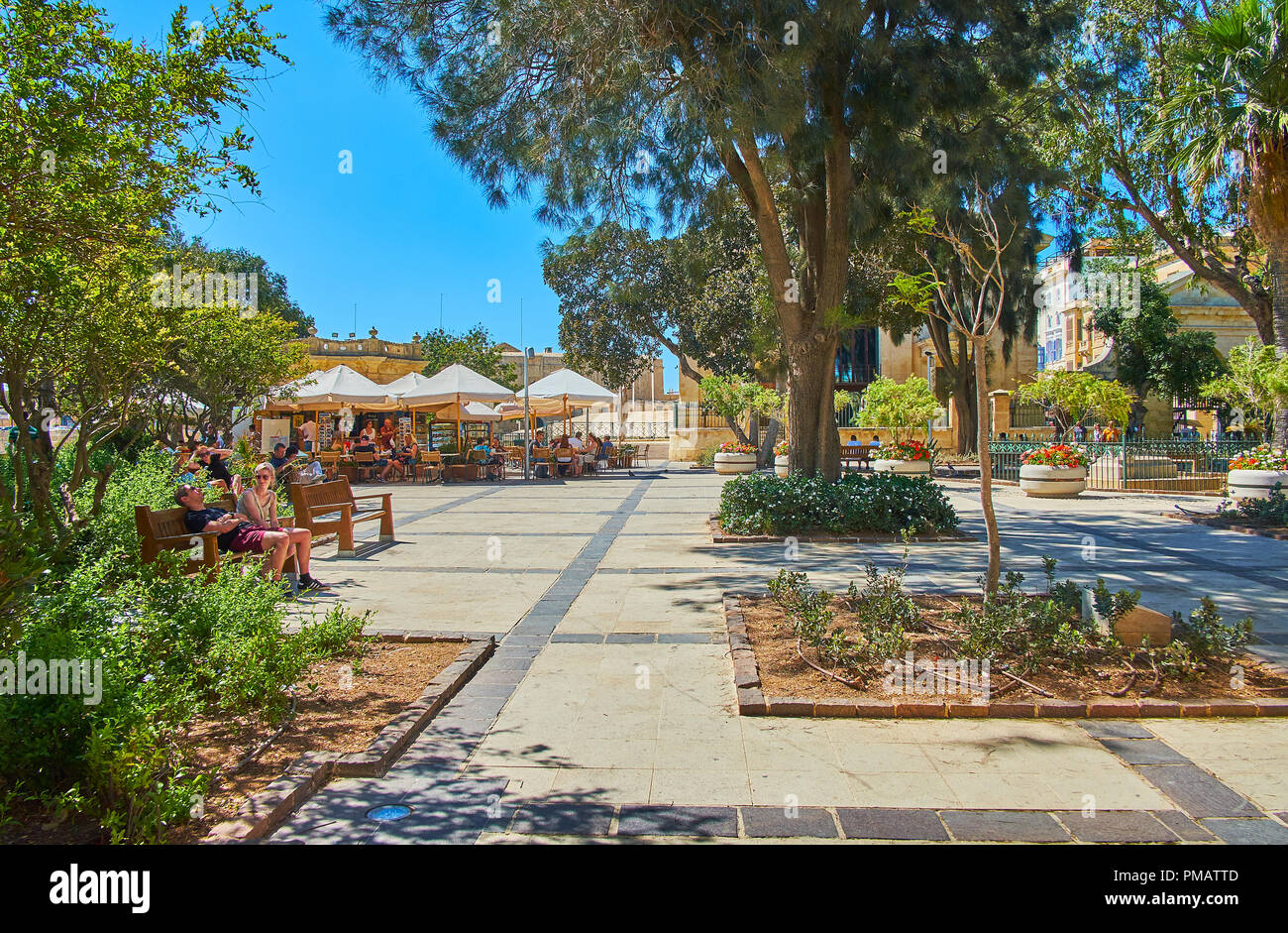 VALLETTA, MALTA - JUNE 17, 2018: Upper Barrakka Gardens are best place to relax in shade, visit cozy outdoor cafe and enjoy refreshing drinks, on June Stock Photo