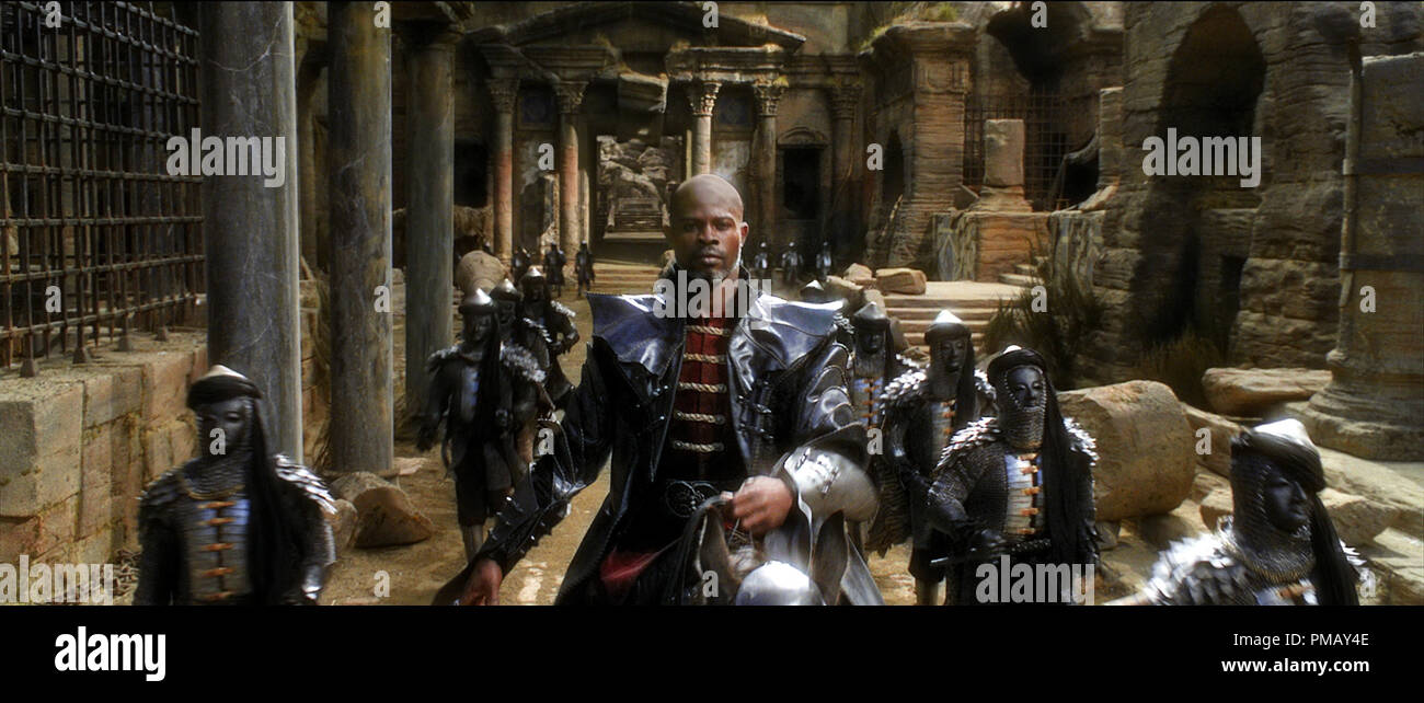 DJIMON HOUNSOU is Radu, a blade-wielding warlock with the power to transform into a raging creature of darkness, in 'Seventh Son'. In a time of enchantments when legends and magic collide, the sole remaining warrior of a mystical order travels to find a prophesized hero born with incredible powers, the last Seventh Son. Stock Photo