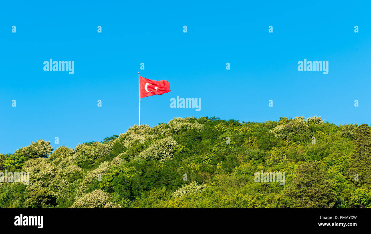 Turkish flag waving in blue sky Stock Photo Alamy