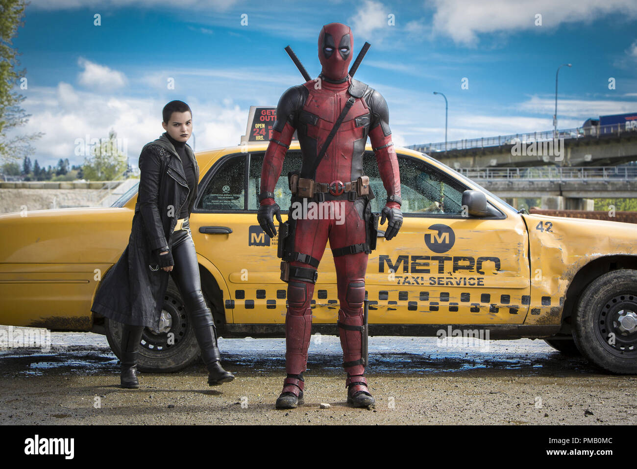 'Deadpool' - Having enjoyed a leisurely cab drive, Deadpool (Ryan Reynolds) is ready for battle, joined by Negasonic Teenage Warhead (Brianna Hildebrand). Stock Photo