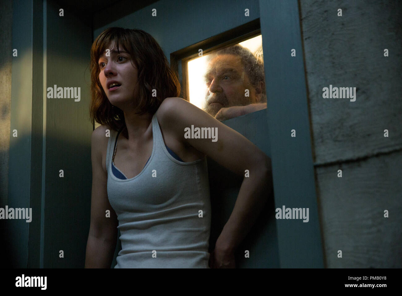 John Goodman as Howard; Mary Elizabeth Winstead as Michelle in 10
