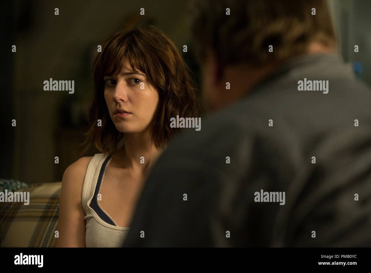John Goodman as Howard; Mary Elizabeth Winstead as Michelle in 10