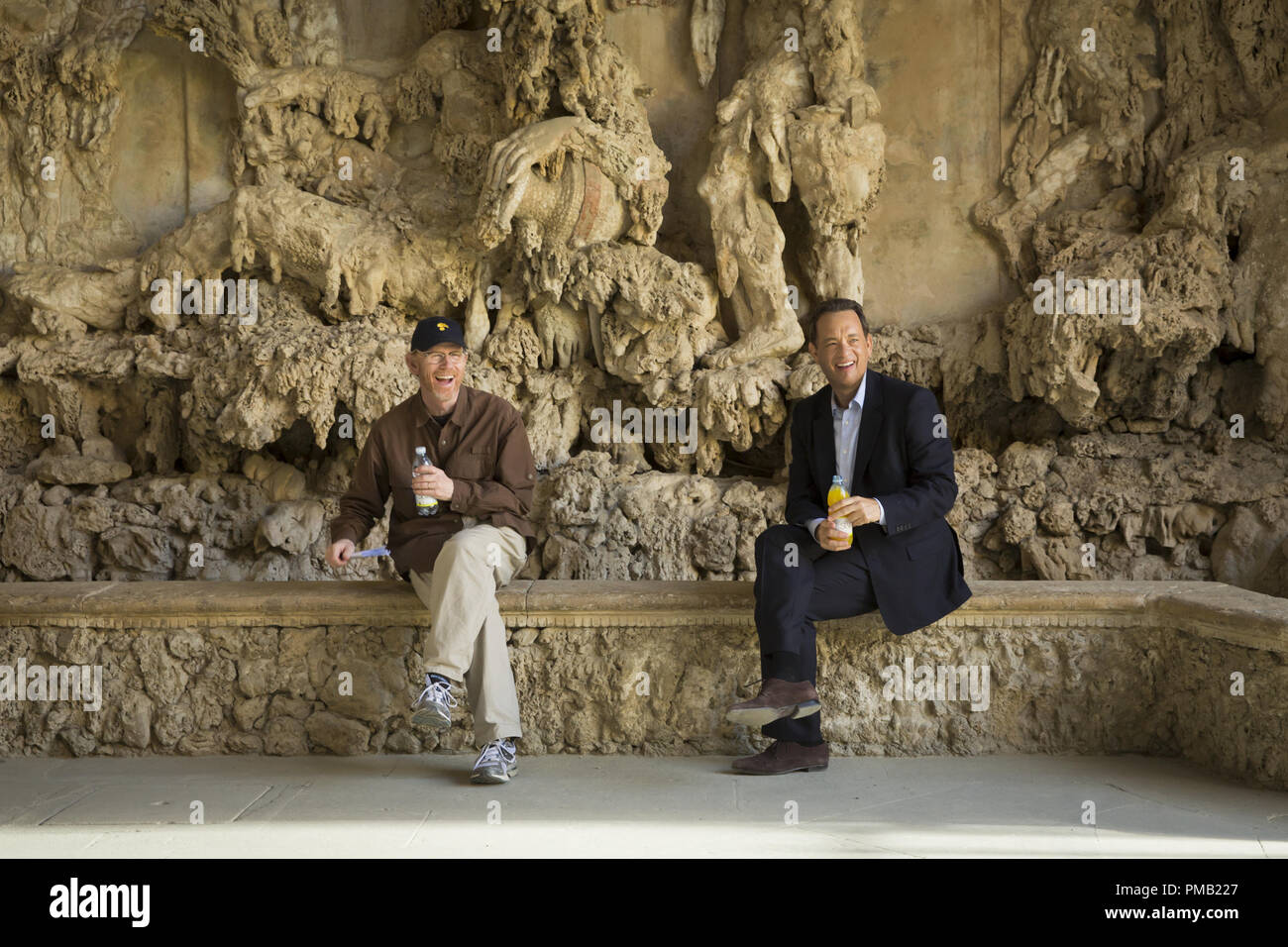 Director/Producer Ron Howard and Tom Hanks relax between takes in the Grotto at Boboli Gardens in Columbia Pictures' INFERNO. Stock Photo
