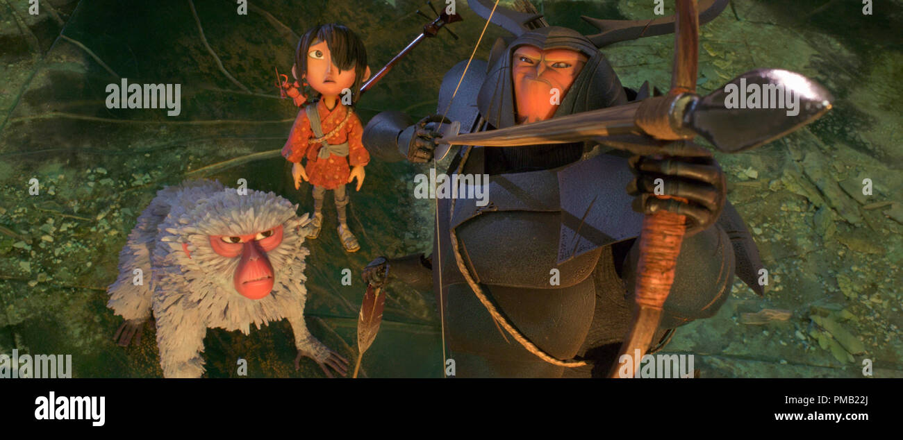 (l-r.) The battle is joined for Monkey (voiced by Academy Award winner Charlize Theron), Kubo (Art Parkinson), and Beetle (Academy Award winner Matthew McConaughey) in animation studio LAIKA's epic action-adventure KUBO AND THE TWO STRINGS, a Focus Features release. (2016) Focus Features Stock Photo