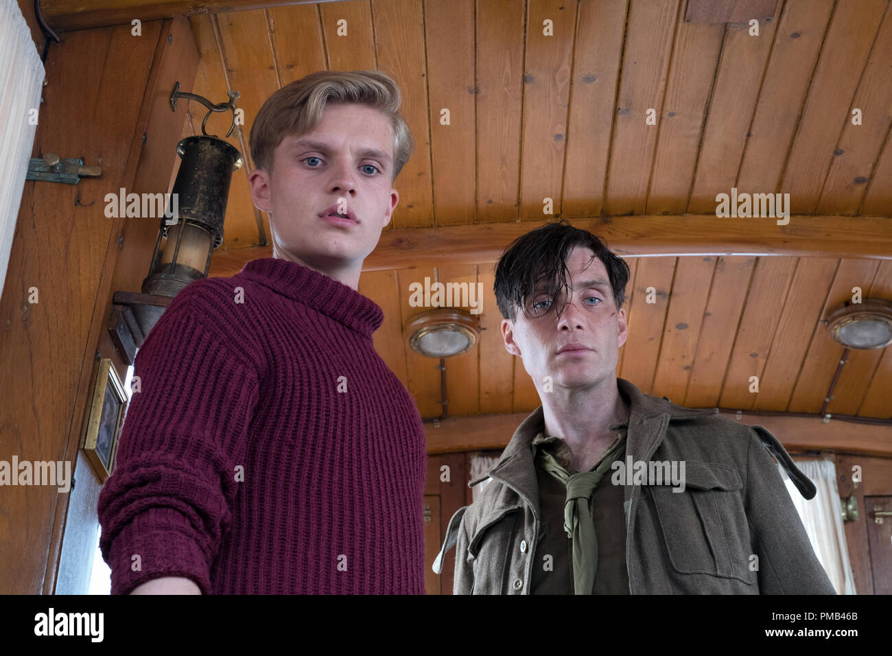 L-R) TOM GLYNN-CARNEY as Peter and CILLIAN MURPHY as Shivering Soldier in  the Warner Bros. Pictures action thriller "DUNKIRK," a Warner Bros.  Pictures release Stock Photo - Alamy