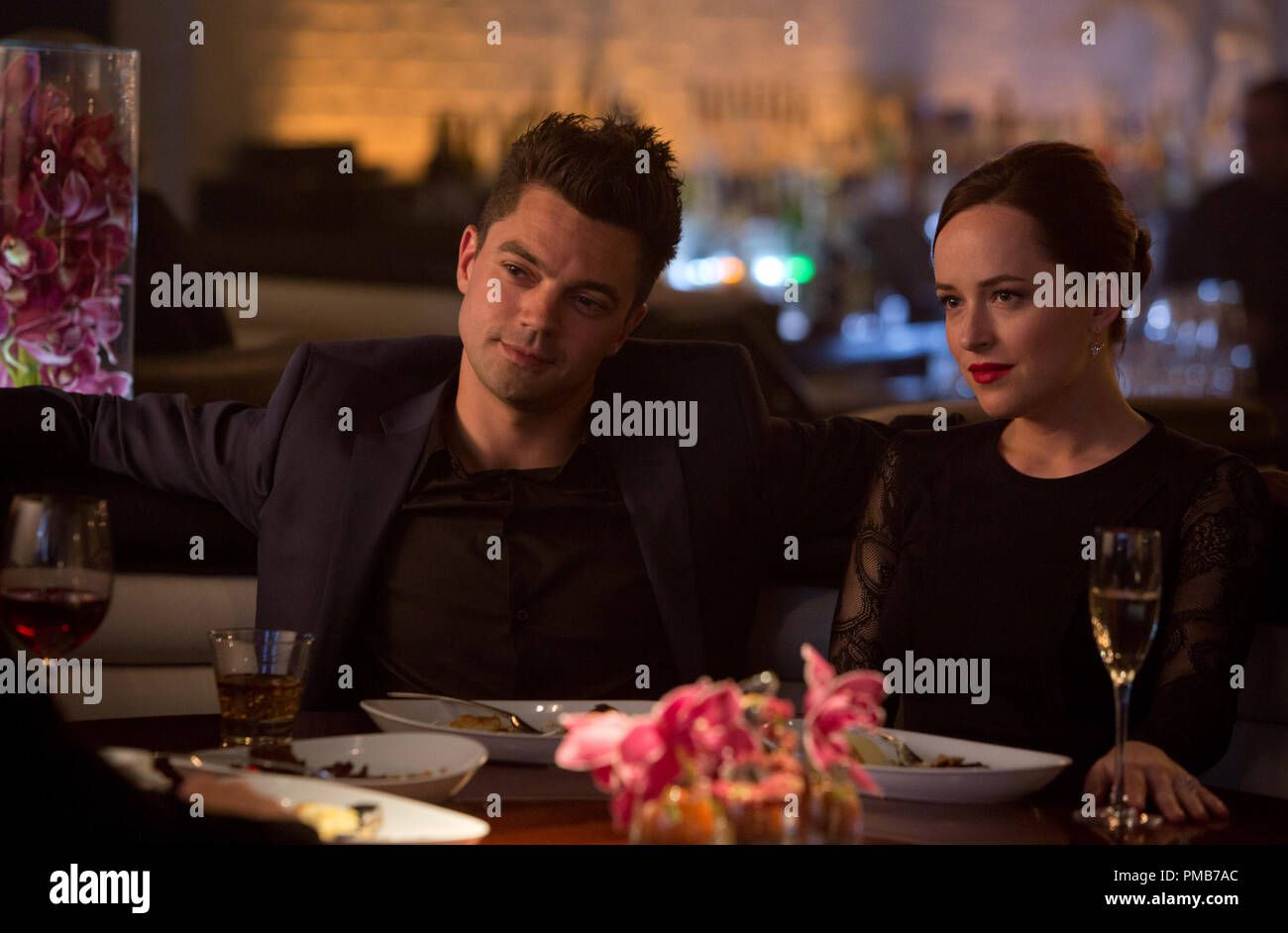 Dominic Cooper as Dino Brewster and Dakota Johnson as Anita co-star in  DreamWorks Pictures' "Need