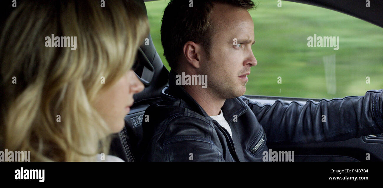 Tobey Marshall (Aaron Paul) and Julia Maddon (Imogen Poots) have less than  45 hours to race from New York to California in DreamWorks Pictures' "Need  for Speed", an exciting return to the