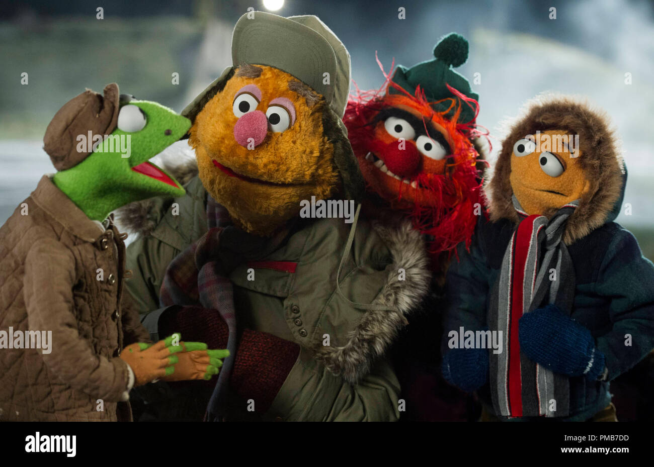 MUPPETS MOST WANTED (L-R) KERMIT THE FROG, FOZZIE BEAR, ANIMAL and WALTER, Photo by: Jay Maidment./ Walt Disney Studios Motion Pictures. Stock Photo