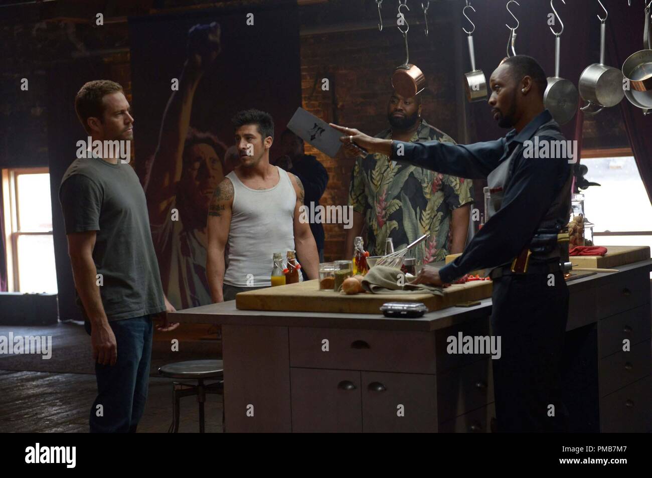 (Left to right.) Paul Walker, David Belle, Kwasi Songui and RZA star in Relativity Media's BRICK MANSIONS.   © 2013 EUROPACORP - TRANSFILM INTERNATIONAL INC.  Photo Credit: Philippe Bosse Stock Photo