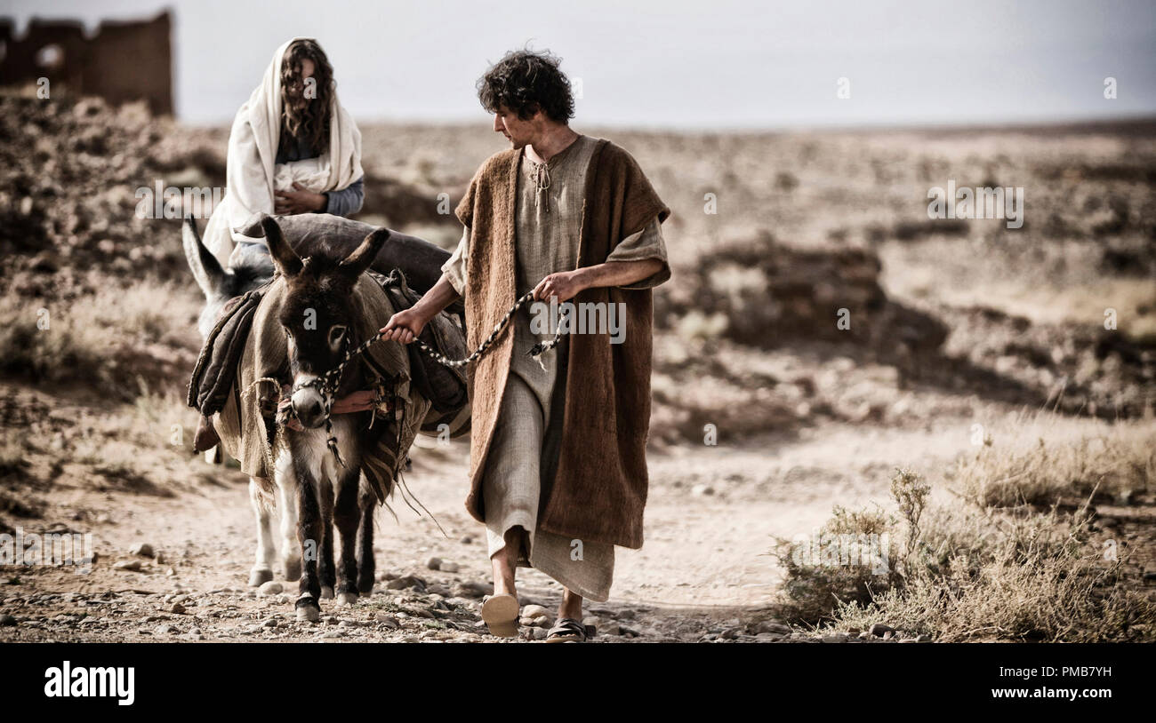 Mary (Leila Mimmack) and Joseph (Joe Coen) embark upon a memorable trek through the desert. 'Son Of God' (2014) Stock Photo