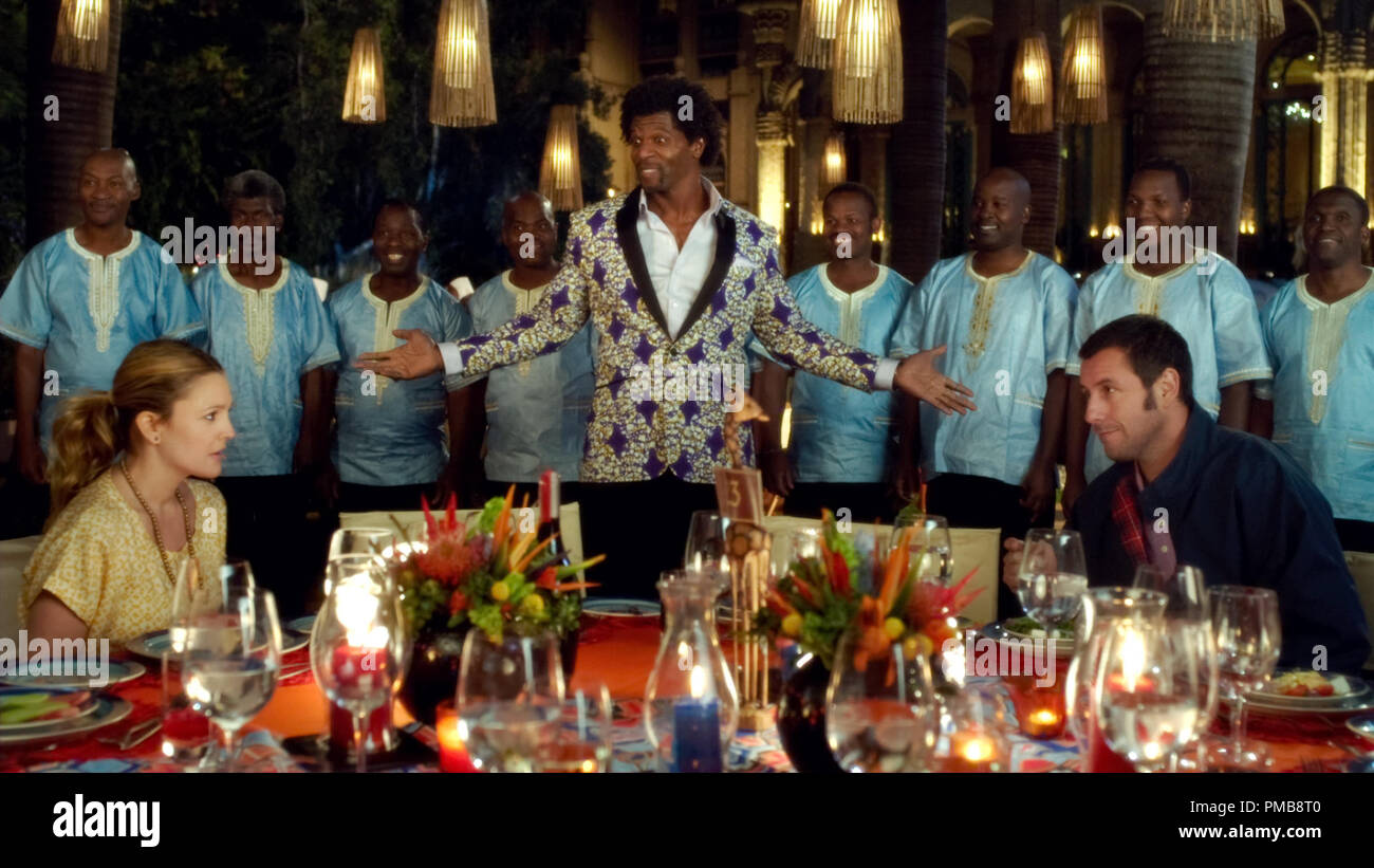 (L-r) DREW BARRYMORE as Lauren, TERRY CREWS as Nickens with backup singers Thathoo played by JUNIOR MAMBAZO and ADAM SANDLER as Jim in Warner Bros. Pictures' romantic comedy 'BLENDED,' a Warner Bros. Pictures release. Stock Photo