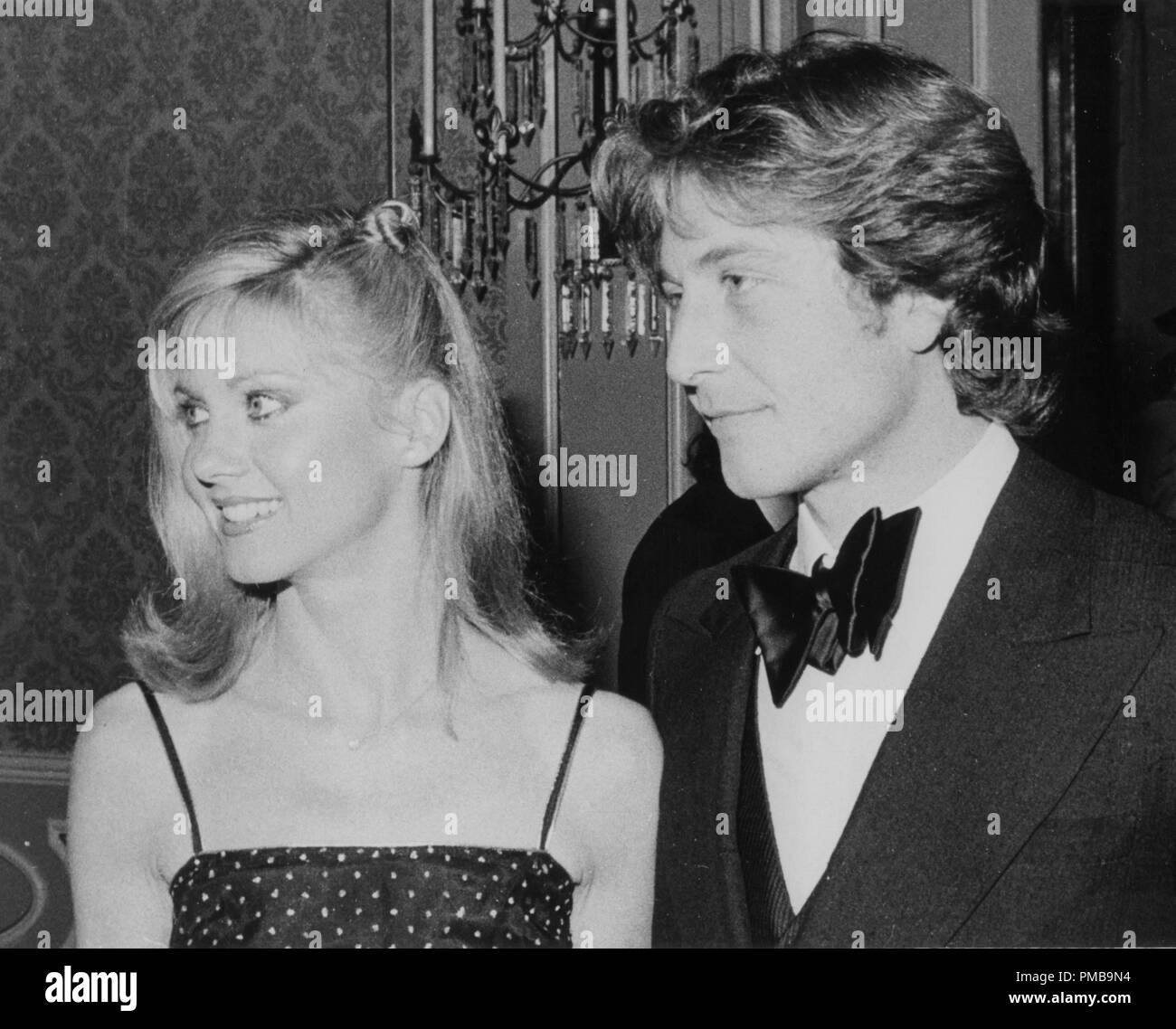 Olivia Newton-John with her date, Lee Krame,r at the 36th Annual Golden Globe Awards, 1979  File Reference # 32557_889THA Stock Photo
