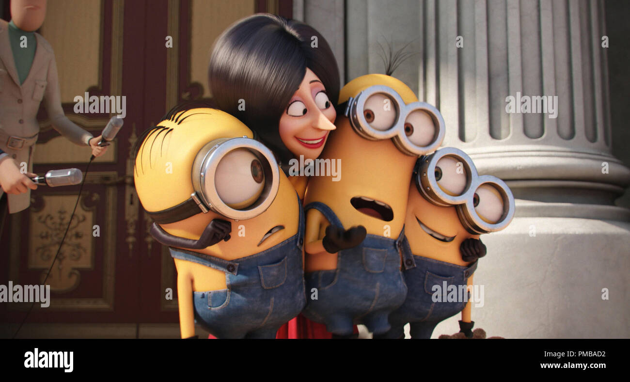 'Minions' (2015) Scarlet Overkill (voiced by SANDRA BULLOCK), the first ever female super-villain, squeezes (L to R) STUART, KEVIN and BOB tight in 'Minions', Universal Pictures and Illumination Entertainment's comedy adventure in which the Minions try to save all Minionkind...from annihilation. Stock Photo