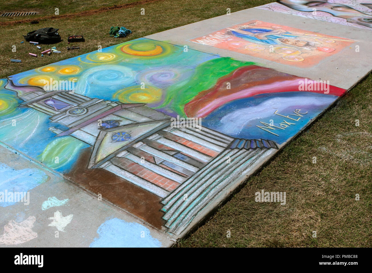 Chalk art covers a sidewalk at a public park at the Lawrenceville Arts Fest on April 28, 2018 in Lawrenceville, GA. Stock Photo