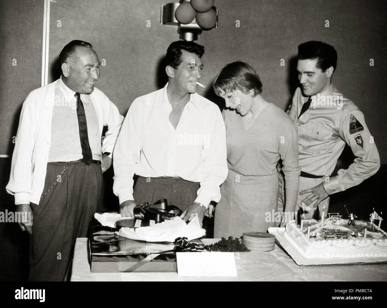 Dean Martin celebrates his birthday with producer Hal Wallis, Shirley