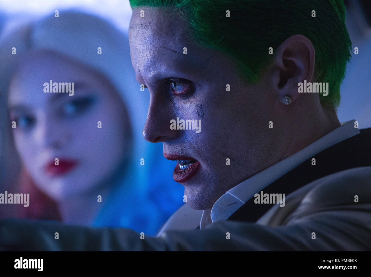 L-r) MARGOT ROBBIE as Harley Quinn and JARED LETO as The Joker in Warner  Bros. Pictures' action adventure 