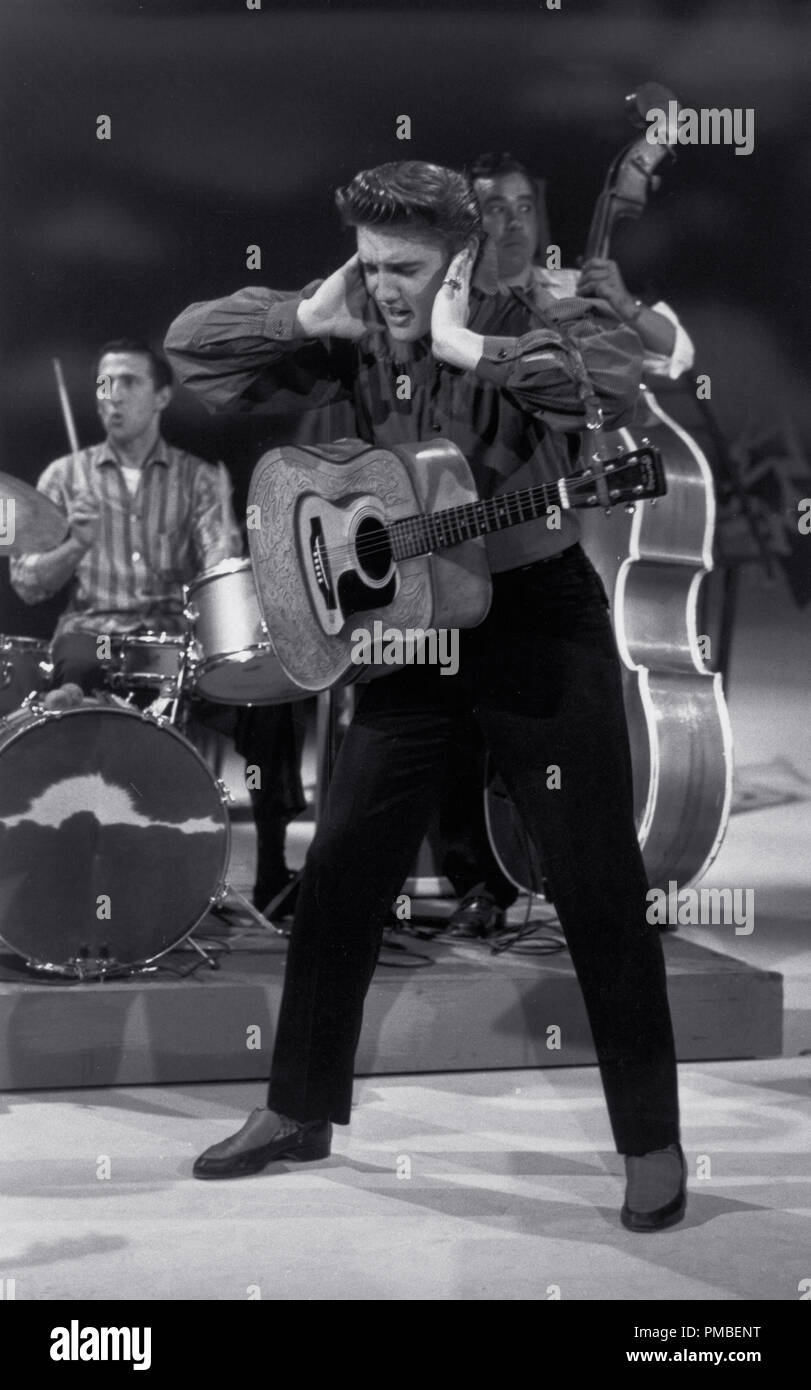 Elvis Presley performing during his first appearance on 'The Ed Sullivan Show,' September 9, 1956 in Los Angeles, CA CBS  File Reference # 33371 853THA Stock Photo