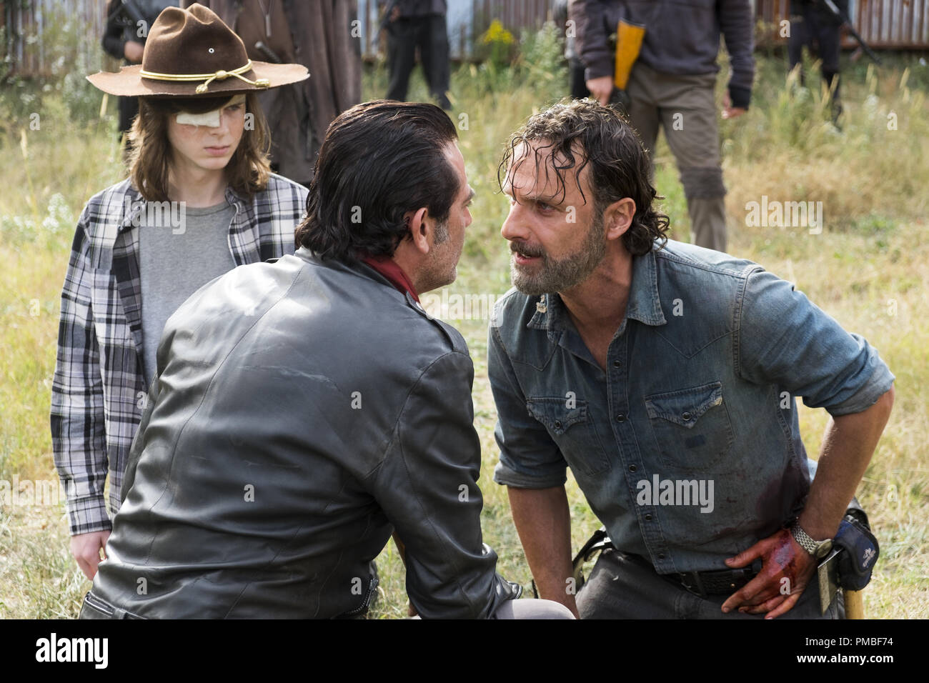 Chandler Riggs, Jeffrey Dean Morgan, Andrew Lincoln,  'The Walking Dead' Season 7 (2016-2017) AMC Stock Photo