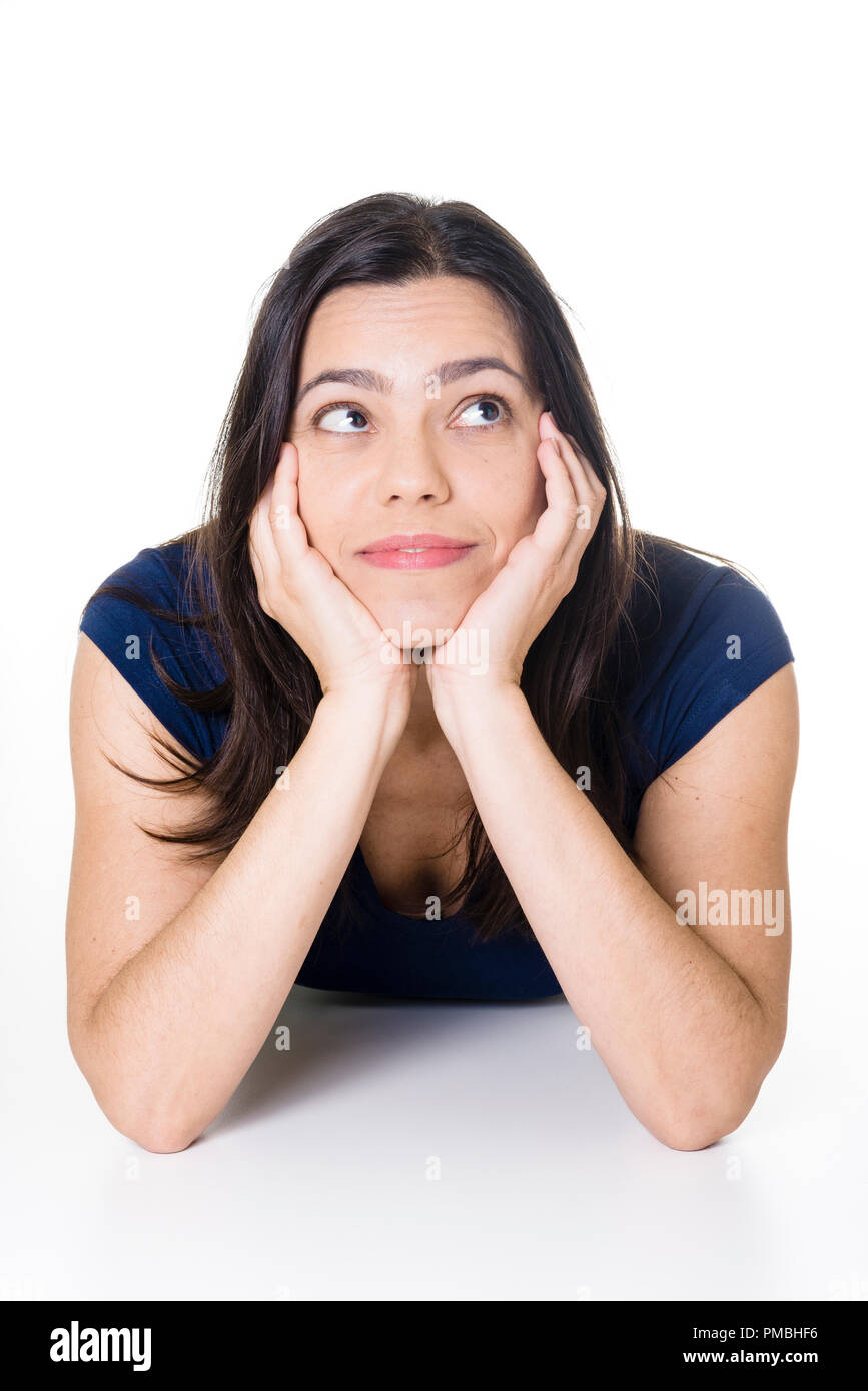 Close portrait of a lovely brunette lying down. Stock Photo