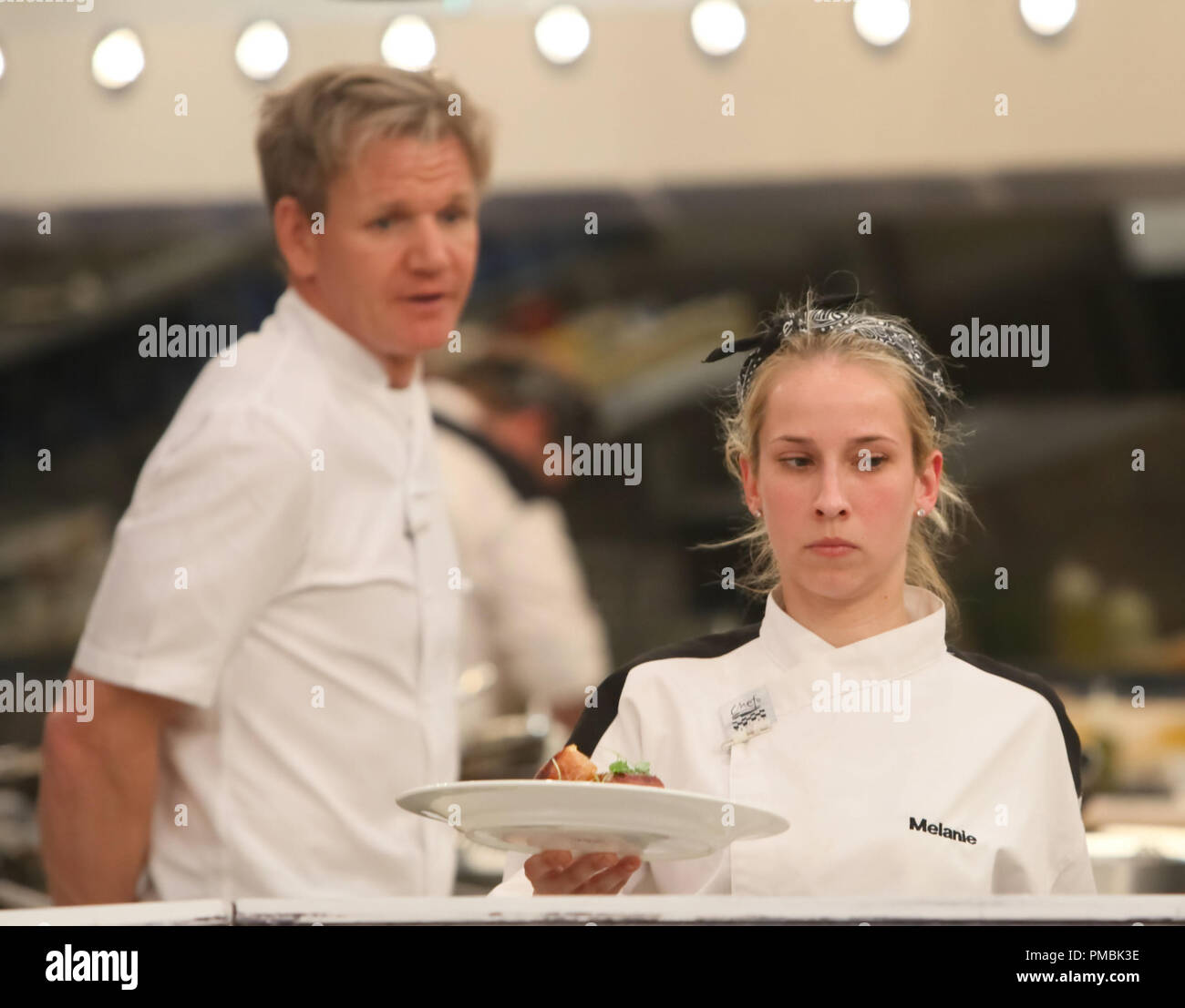HELL'S  KITCHEN: L-R: Chef Ramsay and contestant Melanie during dinner service in '4 Chefs Compete' episode of HELL'S KITCHEN Stock Photo