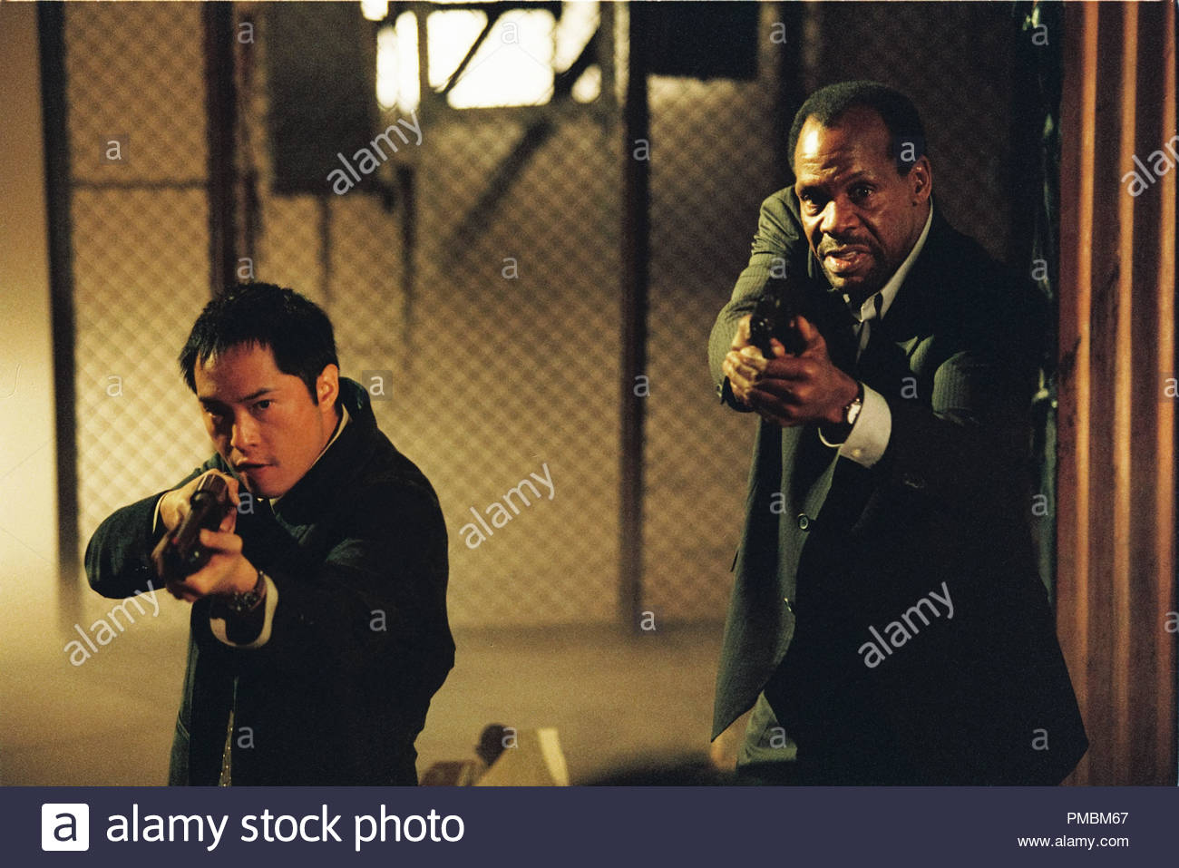 Sing Ken Leung Left And Tapp Danny Glover Right In Saw Stock