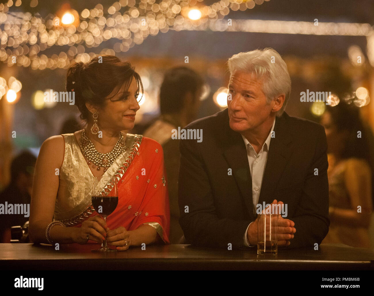 Lillete Dubey as 'Mrs. Kapoor' and Richard Gere as 'Guy' in THE BEST EXOTIC MARIGOLD HOTEL 2. Photo by: Laurie Sparham. Stock Photo