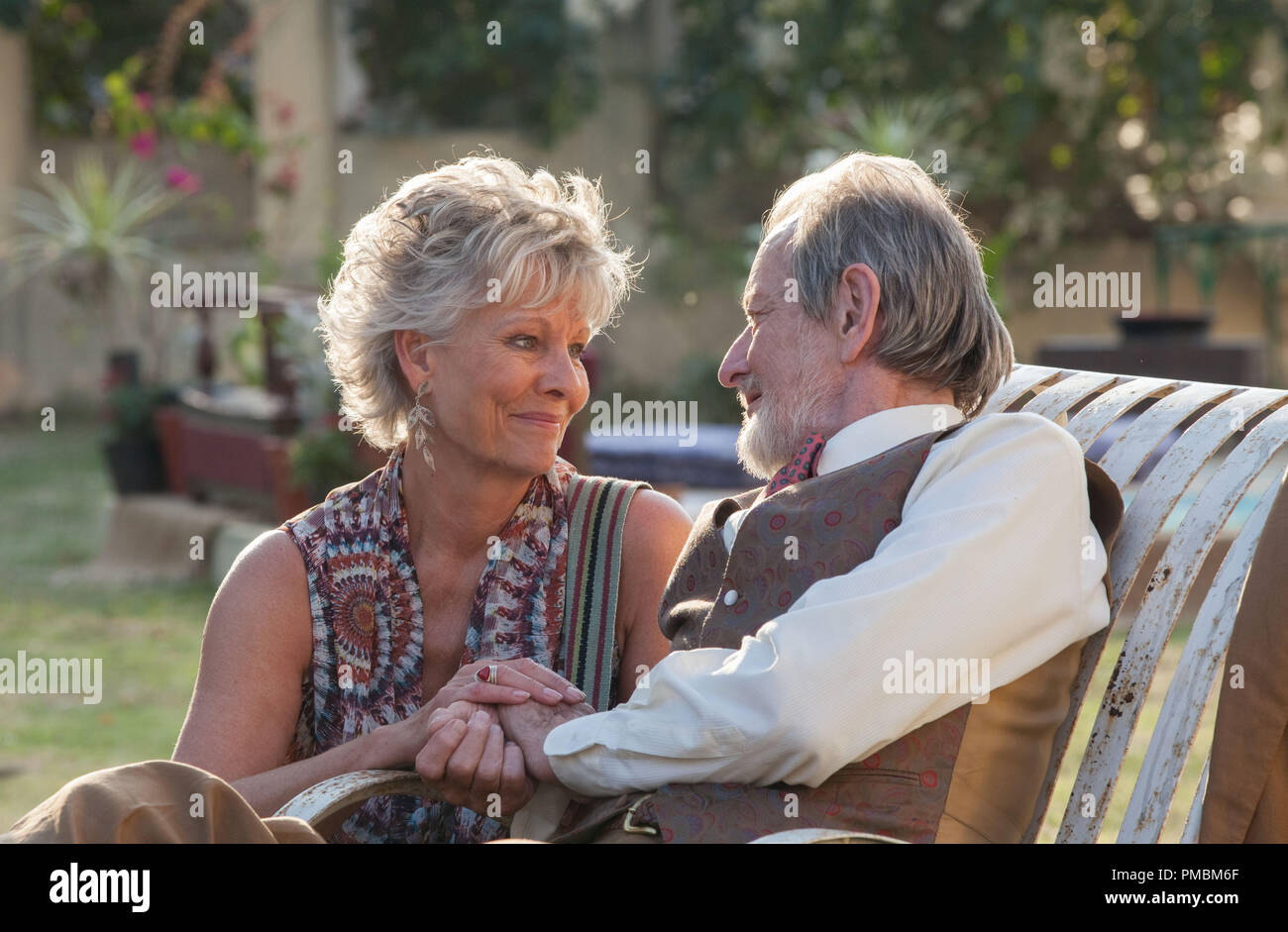 Diana Hardcastle as 'Carol' and Ronald Pickup as 'Norman Cousins' in THE BEST EXOTIC MARIGOLD HOTEL 2. Photo by: Laurie Sparham. Stock Photo