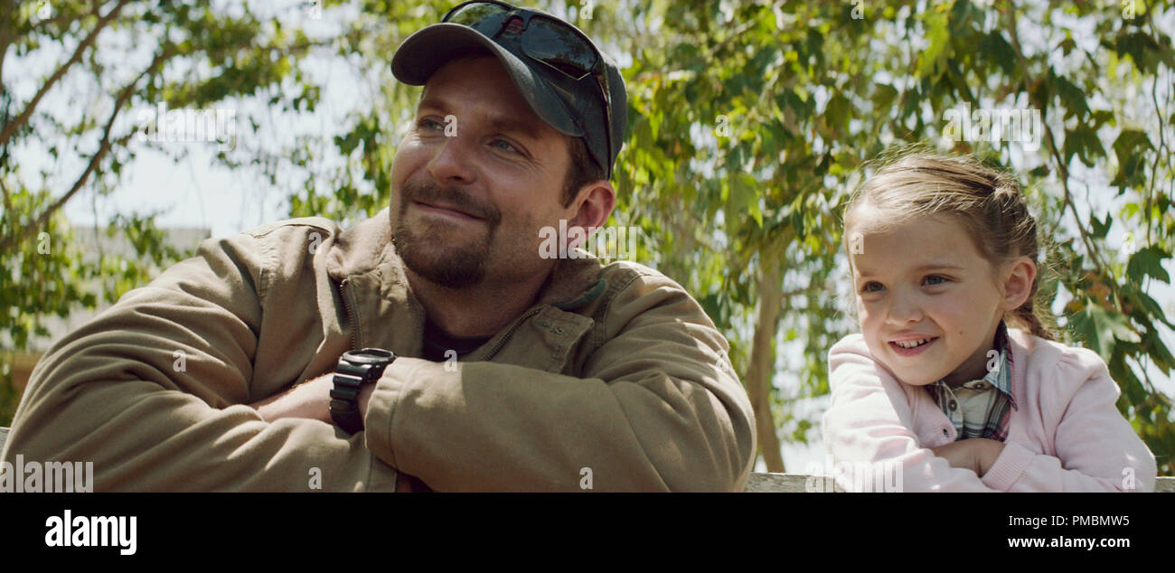 (L r) BRADLEY COOPER as Chris Kyle and MADELEINE McGRAW as McKenna in