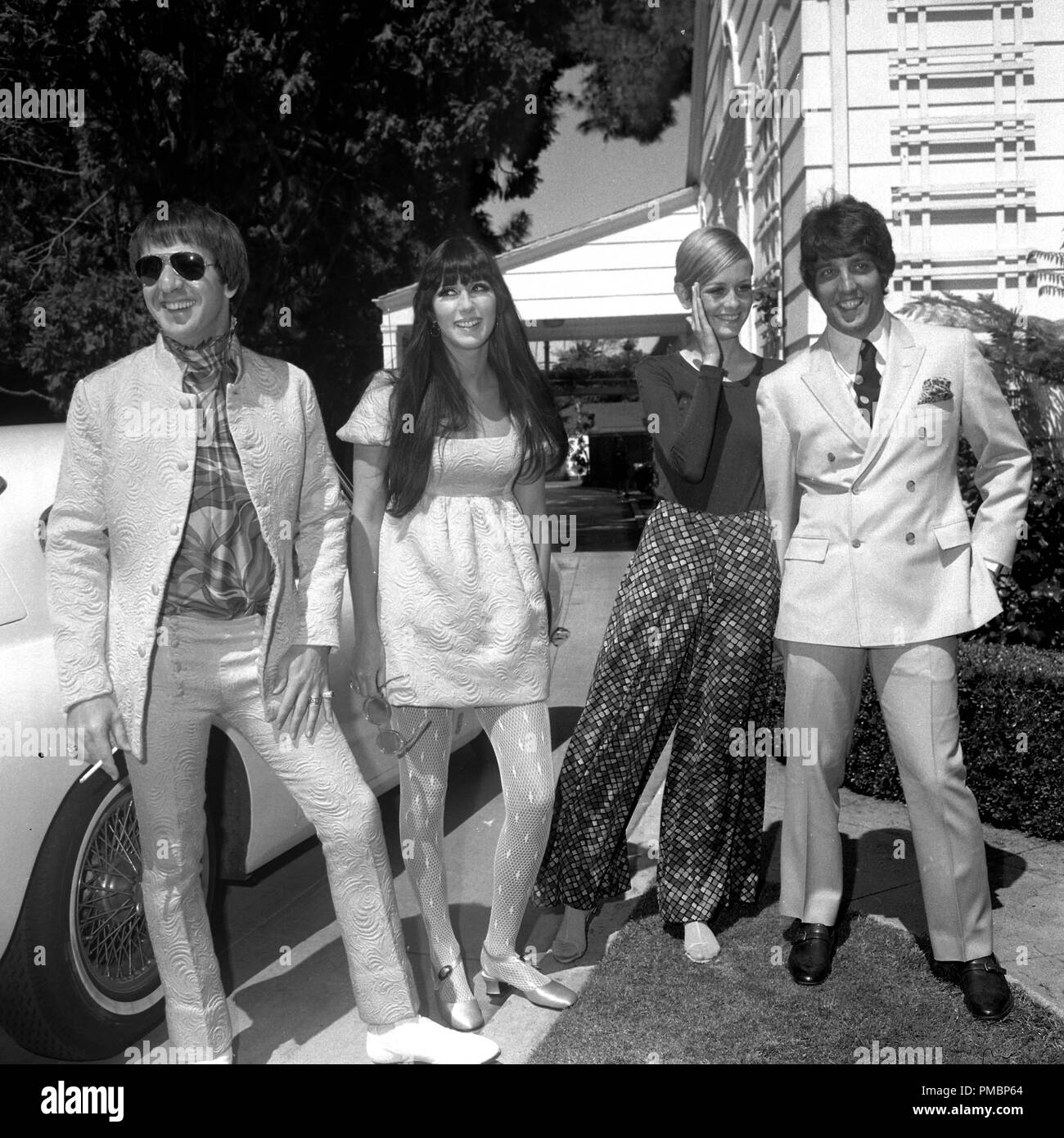 Sonny Bono, Cher, Twiggy and Justin de Villeneuve (Twiggy's boyfriend and manager), at a party held at the house of Sonny and Cher on May 15, 1967 in Beverly Hills, California.© JRC /The Hollywood Archive - All Rights Reserved  File Reference # 32603 269THA Stock Photo