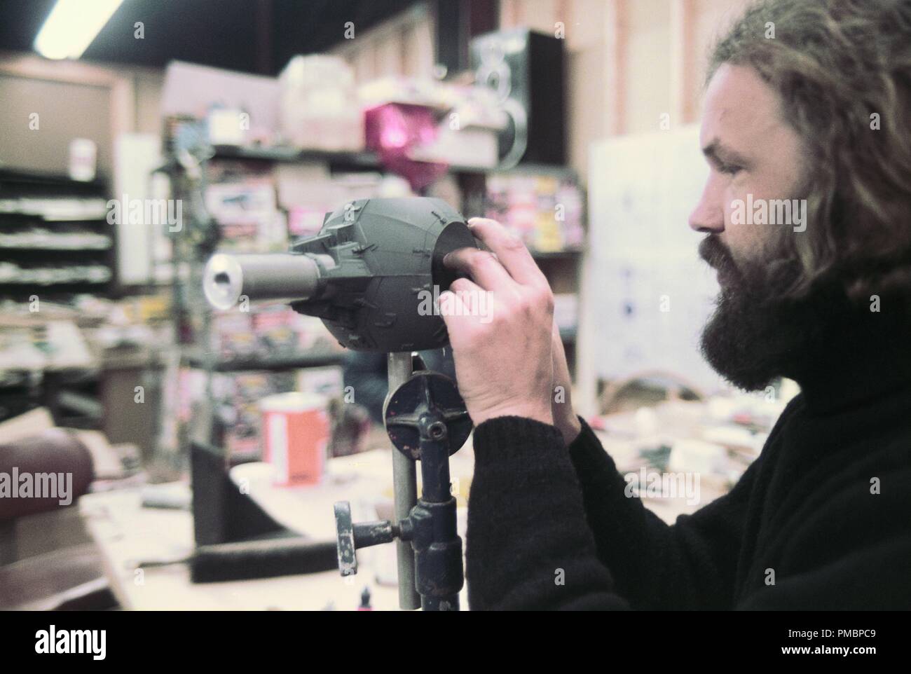 Lorne Peterson building a TIE fighter model in "Star Wars Episode IV A