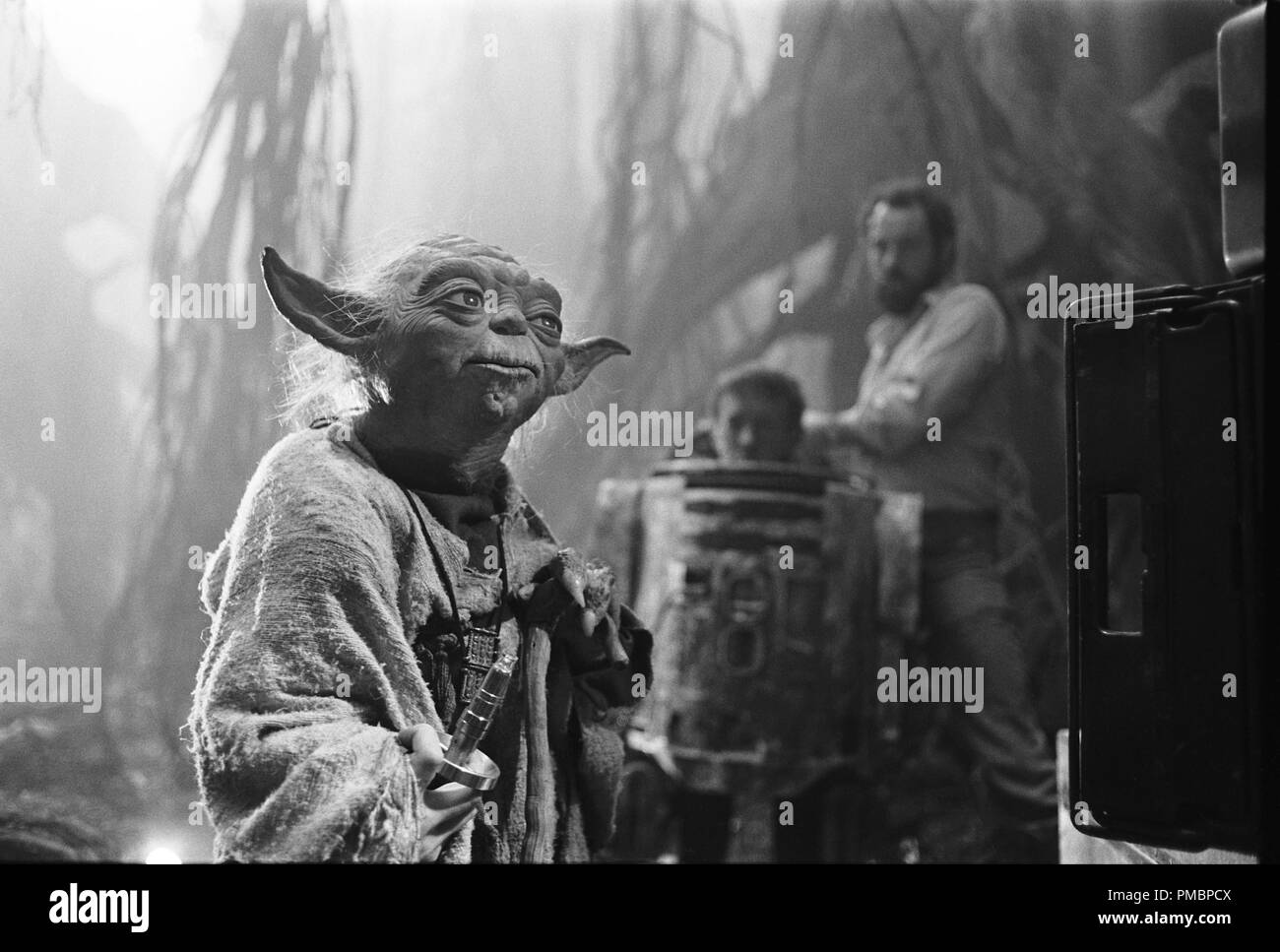 Readying to film Yoda's fight with R2D2 over a stolen lamp in "Star