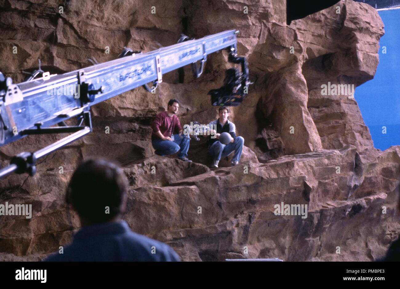 ILM's John Knoll and Jason Snell Prepare for a shot on a Geonosis miniature in 'Star Wars Episode II: Attack of the Clones' (2002)  File Reference # 32603 454THA Stock Photo