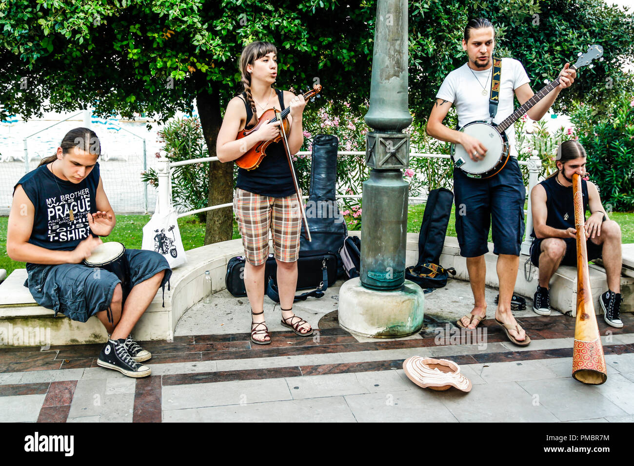 Group of buskers by the park in Opatija, Croatia Stock Photo