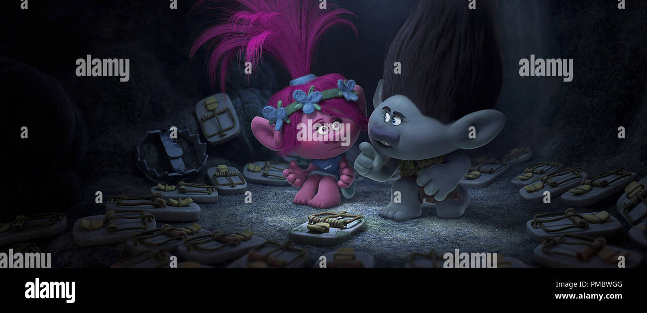 Troll princess Poppy (Left; voiced by Anna Kendrick) is introduced to overly cautious paranoid survivalist Branch's (Right; voiced by Justin Timberlake) fear bunker in DreamWorks Animation's TROLLS. Stock Photo