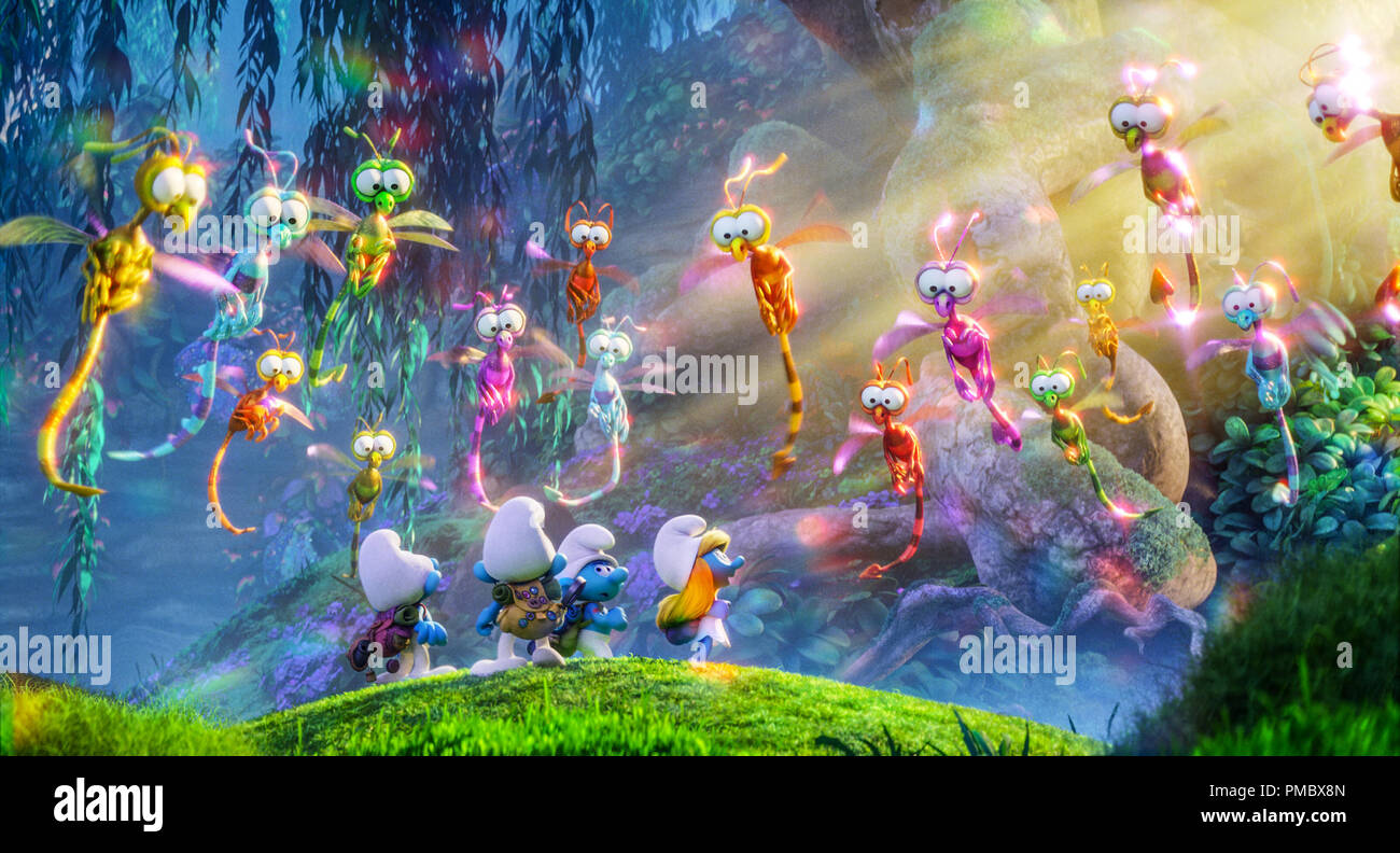 Clumsy (Jack McBrayer), Brainy (Dany Pudi), Hefty (Joe Manganiello) and Smurfette (Demi Lovato) in the Forbidden Forest in Columbia Pictures and Sony Pictures Animation's SMURFS: THE LOST VILLAGE. (2017) Stock Photo
