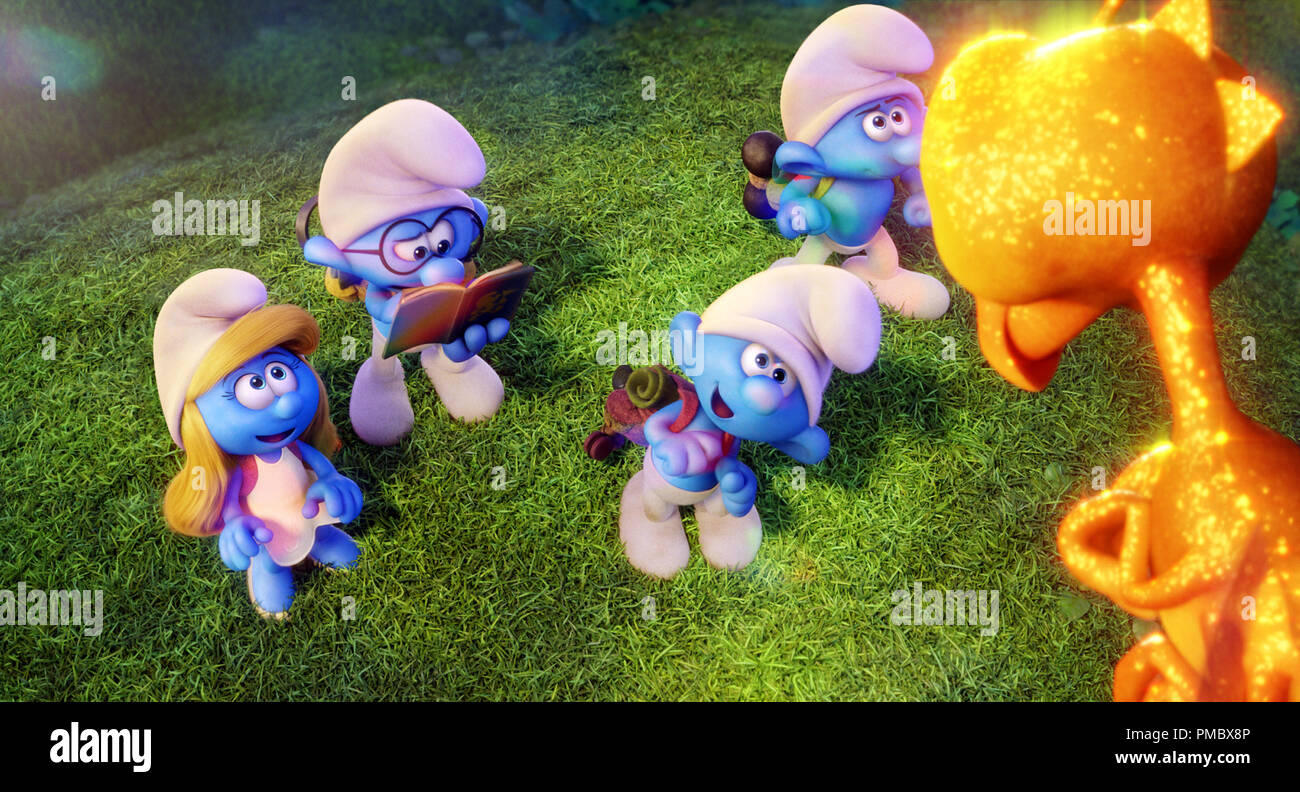 Smurfette (Demi Lovato), Brainy (Danny Pudi) Clumsy (Jack McBrayer) and Hefty (Joe Manganiello) meet a dragonfly in Columbia Pictures and Sony Pictures Animation's SMURFS: THE LOST VILLAGE. (2017) Stock Photo