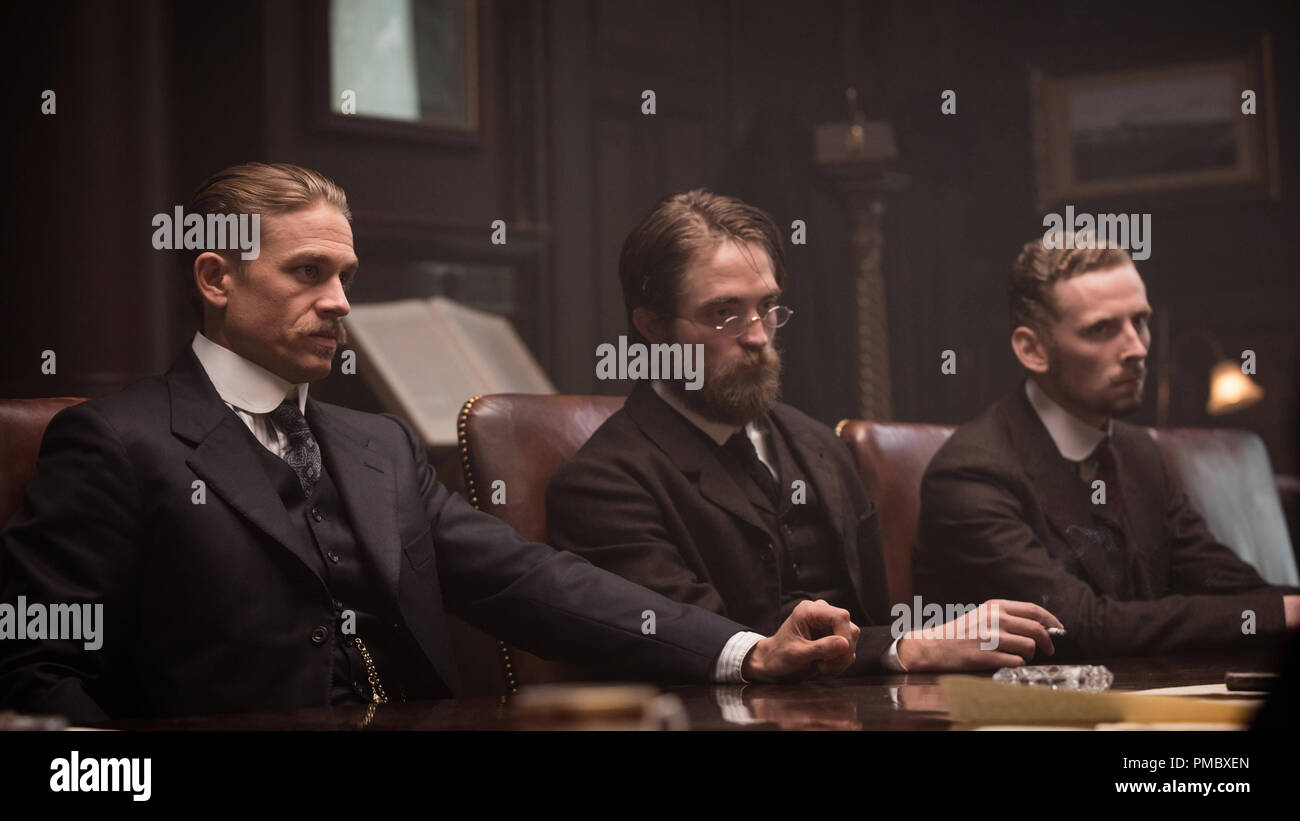 (L to R) Charlie Hunnam as Percy Fawcett, Robert Pattinson as Henry Costin and Edward Ashley as Arthur Manley in director James Gray's THE LOST CITY OF Z, an Amazon Studios and Bleecker Street release. (2017) Stock Photo
