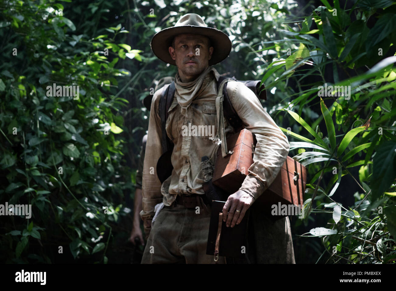 Charlie Hunnam stars as Percy Fawcett in director James Gray's THE LOST CITY OF Z, an Amazon Studios and Bleecker Street release. (2017) Stock Photo